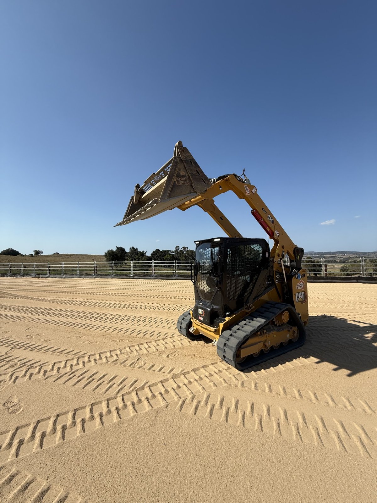 Sandstone retaining wall with rock drainage swale