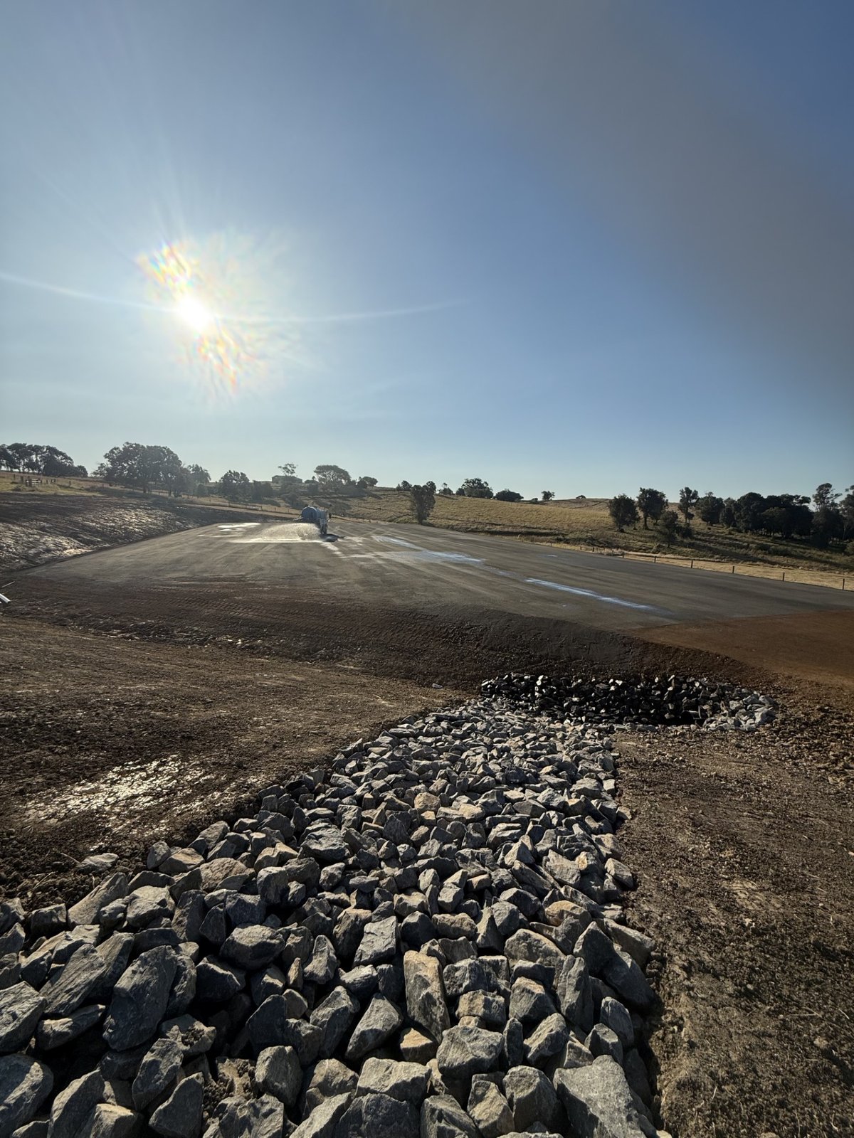 Close up of completed sandstone block retaining wall